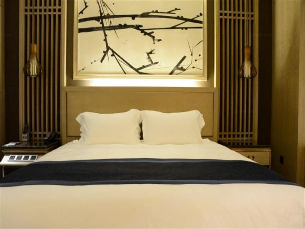 شي نان Enjoy Hotel المظهر الخارجي الصورة