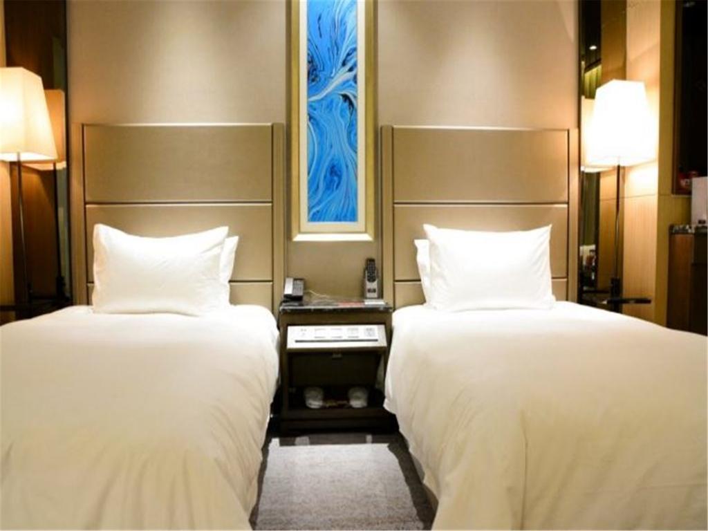 شي نان Enjoy Hotel المظهر الخارجي الصورة