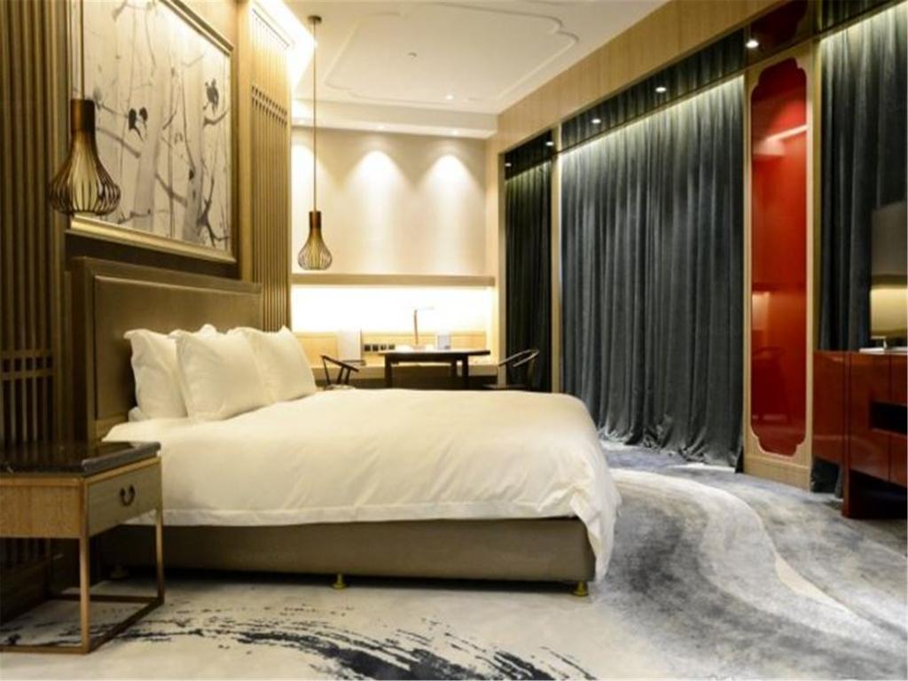 شي نان Enjoy Hotel المظهر الخارجي الصورة