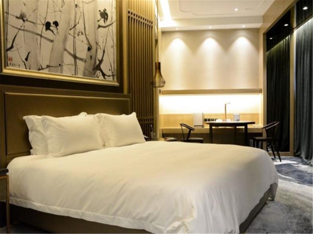 شي نان Enjoy Hotel المظهر الخارجي الصورة