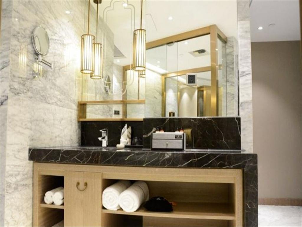 شي نان Enjoy Hotel المظهر الخارجي الصورة