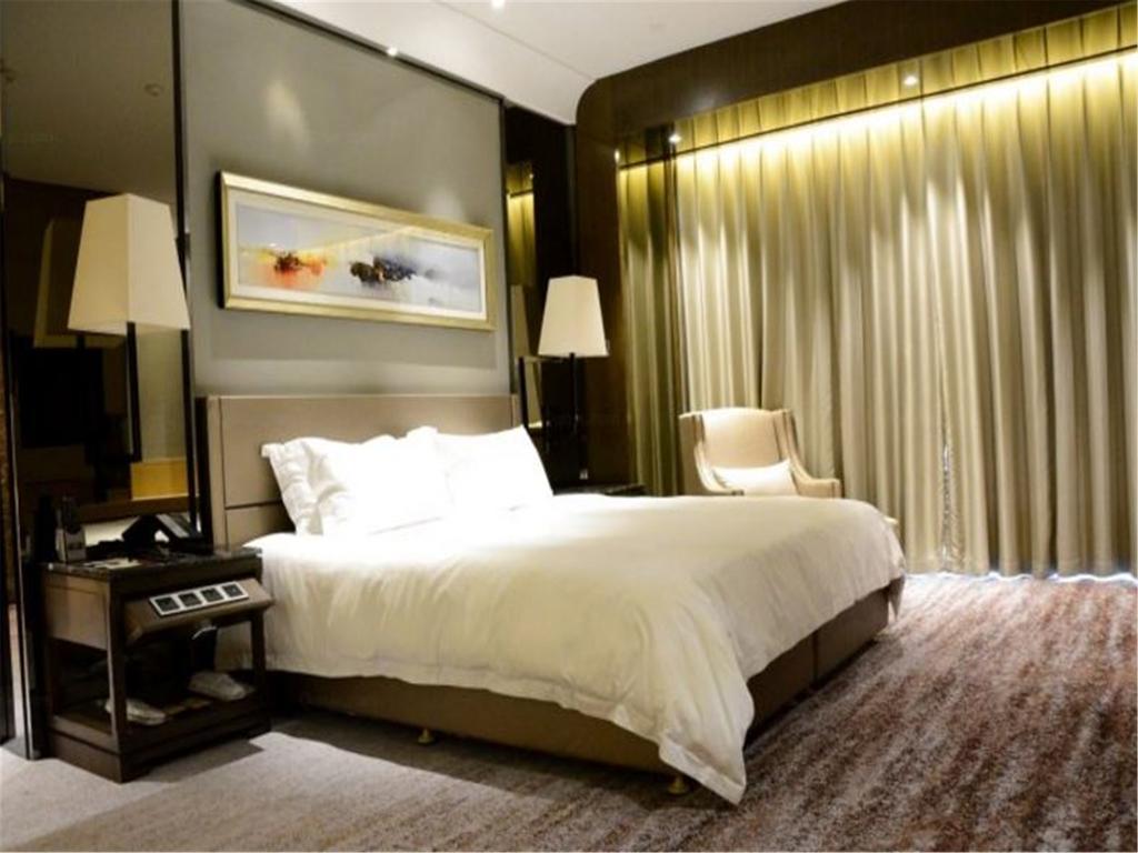شي نان Enjoy Hotel المظهر الخارجي الصورة