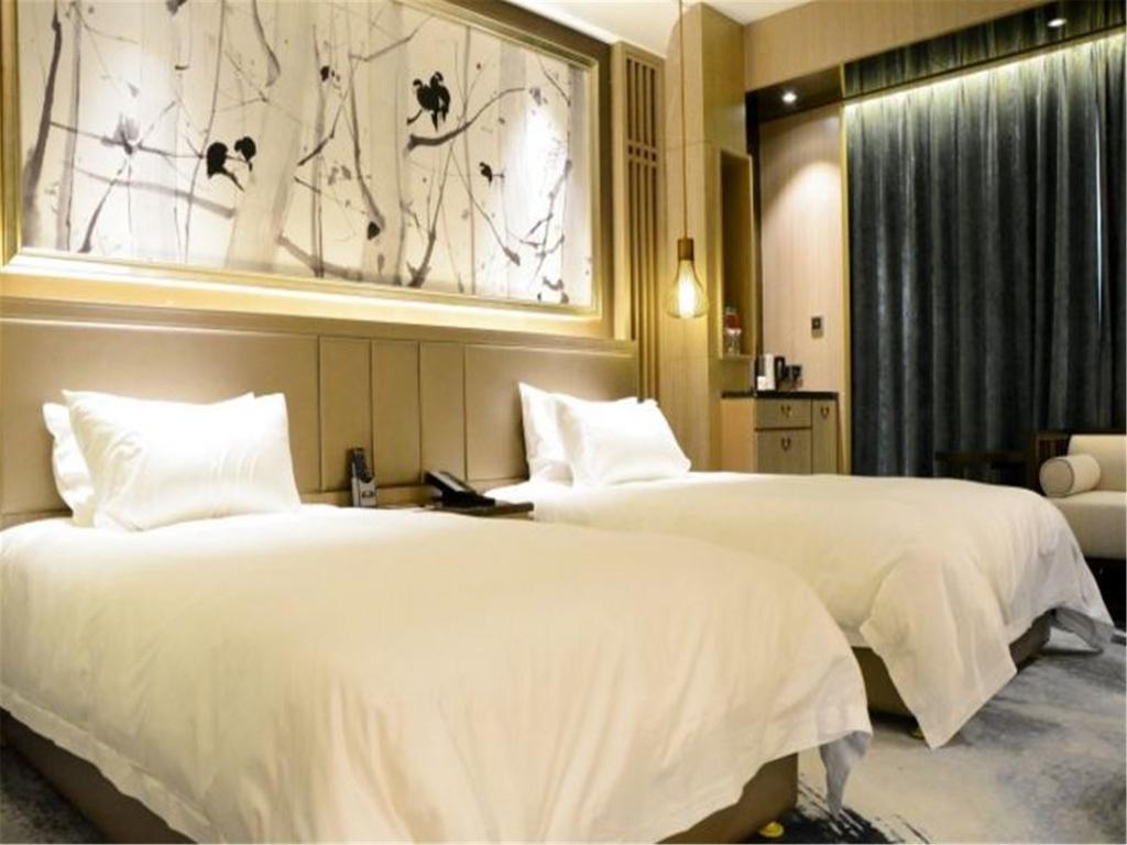 شي نان Enjoy Hotel المظهر الخارجي الصورة