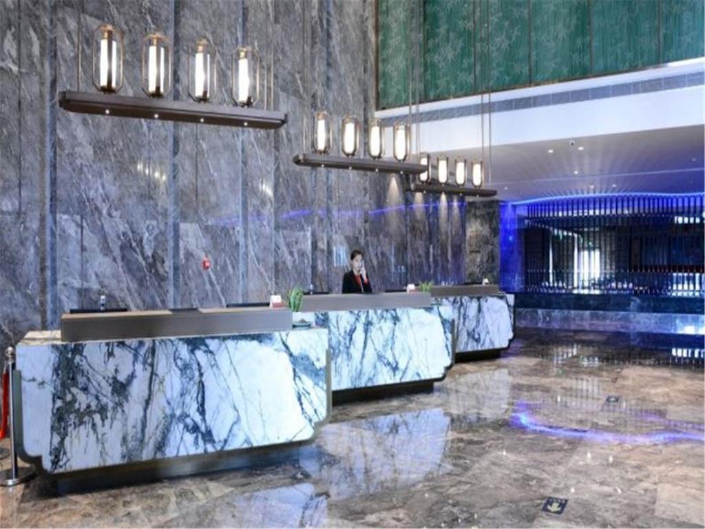 شي نان Enjoy Hotel المظهر الخارجي الصورة