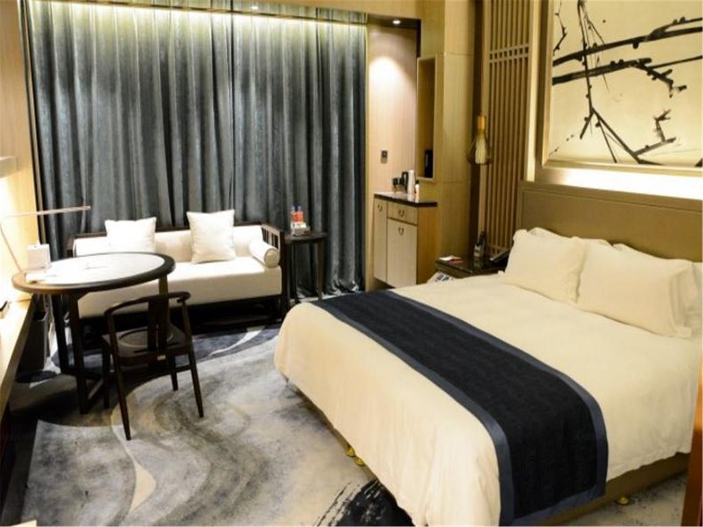 شي نان Enjoy Hotel المظهر الخارجي الصورة