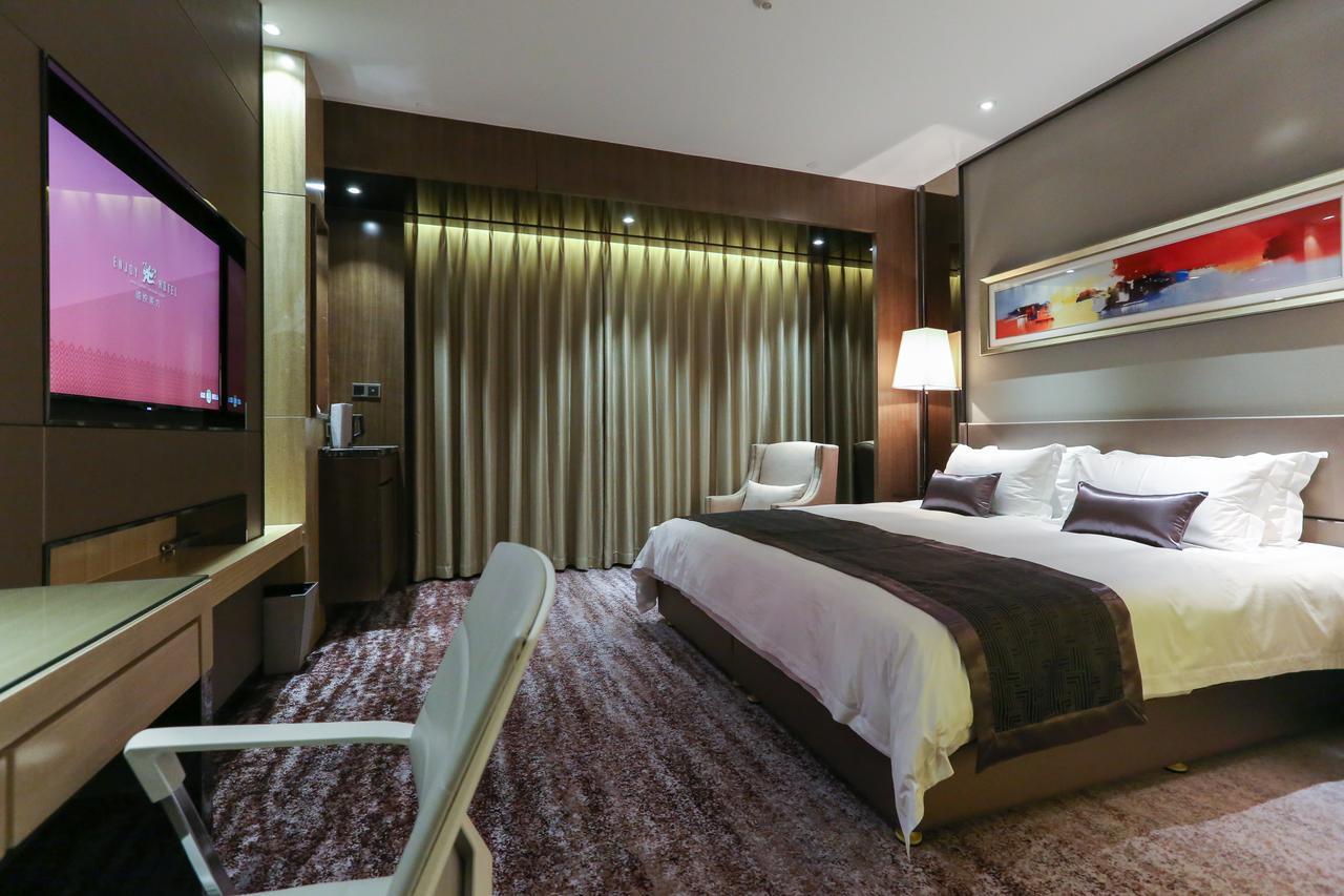 شي نان Enjoy Hotel المظهر الخارجي الصورة
